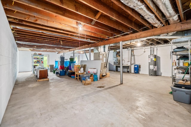 basement featuring electric water heater