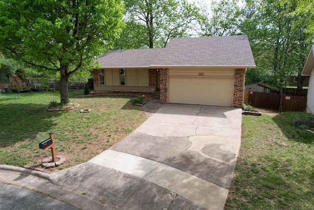 single story home featuring driveway, a front yard, brick siding, fence, and an attached garage