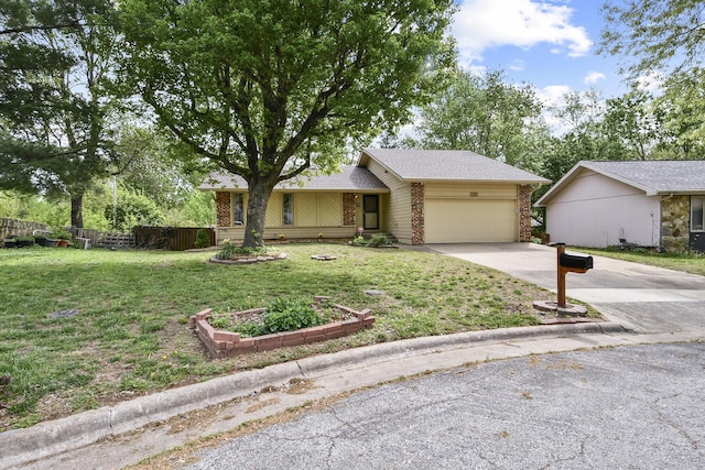 ranch-style home featuring brick siding, fence, a front lawn, concrete driveway, and an attached garage