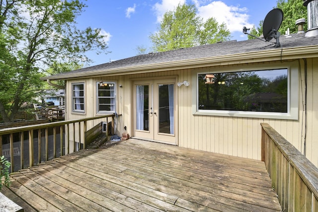 wooden deck featuring french doors