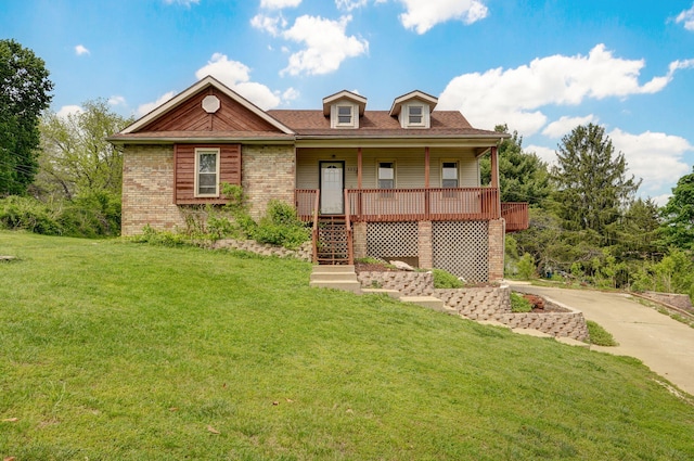 523 E Camino St, Springfield, MO 65810 - view of front of house with brick siding, a front lawn, covered porch, and stairway
