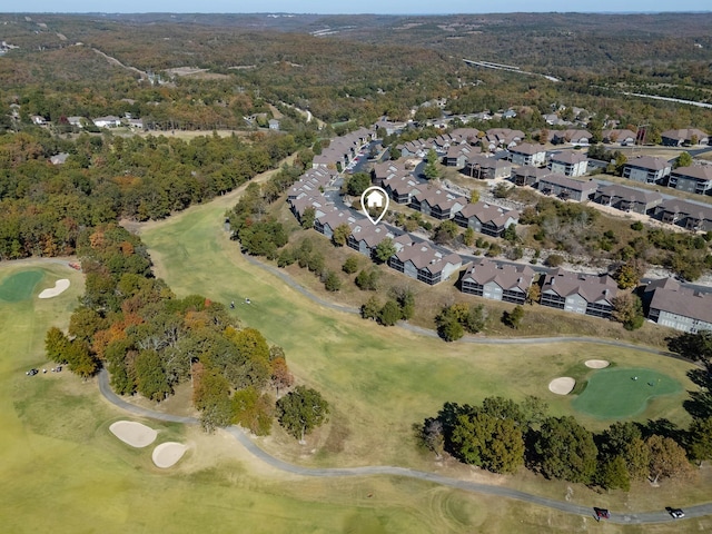 drone / aerial view featuring a residential view and golf course view