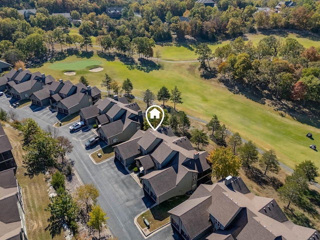 aerial view featuring view of golf course and a residential view