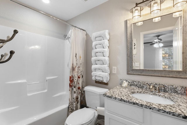 full bath featuring vanity, ceiling fan, toilet, and shower / bathtub combination with curtain