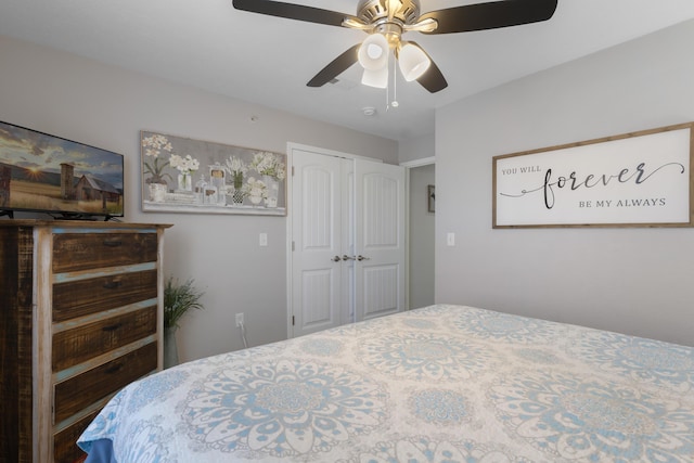 bedroom featuring a ceiling fan and a closet