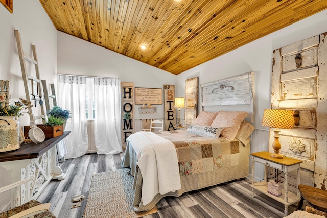bedroom featuring wood finished floors, vaulted ceiling, and wooden ceiling
