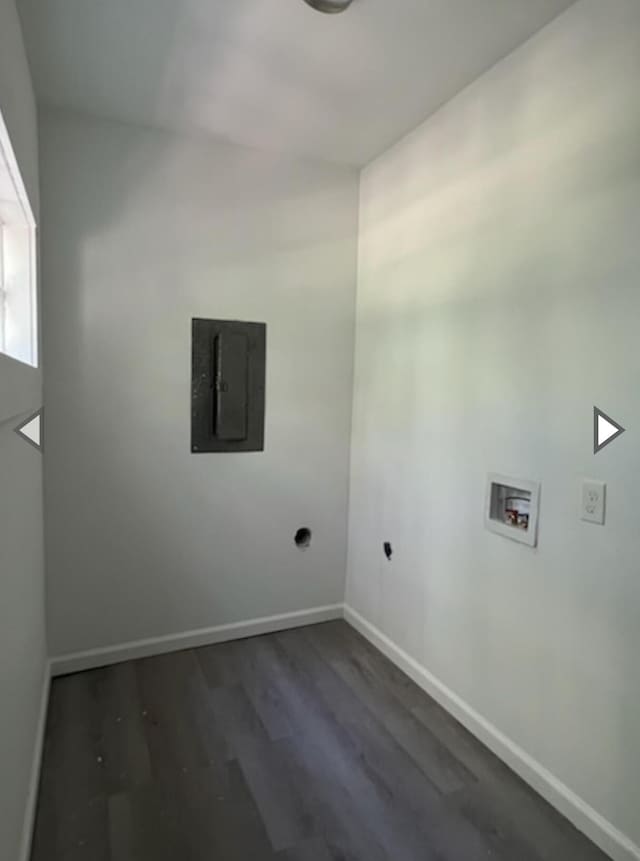 laundry area with dark wood-style flooring, laundry area, hookup for a washing machine, baseboards, and electric panel