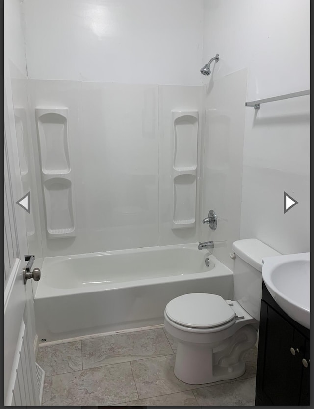 full bathroom featuring toilet, tub / shower combination, and vanity