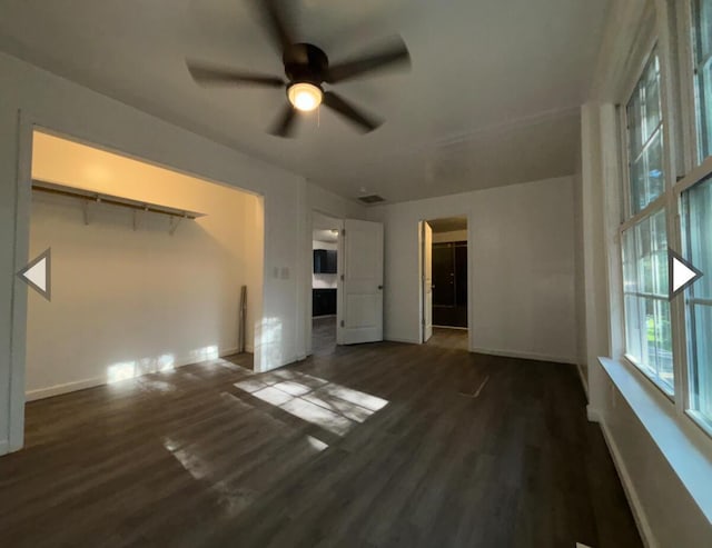 1327 W Livingston St, Springfield, MO 65803 - unfurnished living room featuring visible vents, a ceiling fan, baseboards, and wood finished floors