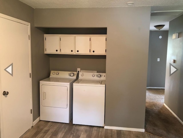 928 N Glenn Ave, Springfield, MO 65803 - clothes washing area with washer and dryer, baseboards, dark wood-style floors, and cabinet space