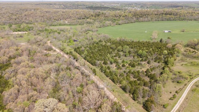 4940 Sellers Ford Rd, Hartville, MO 65667 - birds eye view of property featuring a wooded view and a rural view