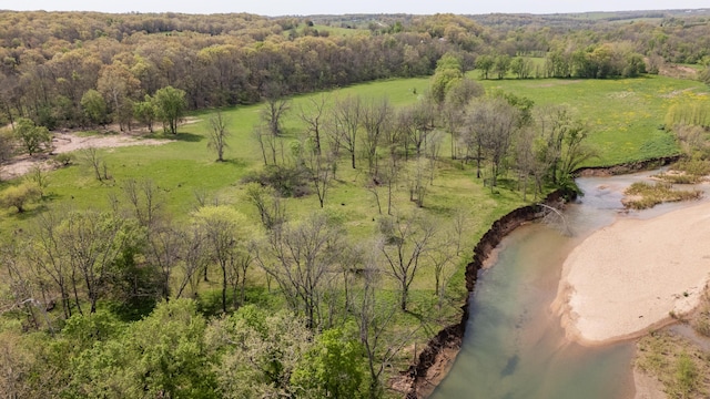 4940 Sellers Ford Rd, Hartville, MO 65667 - drone / aerial view featuring a wooded view