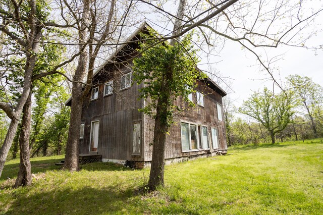 4940 Sellers Ford Rd, Hartville, MO 65667 - view of side of home featuring a yard