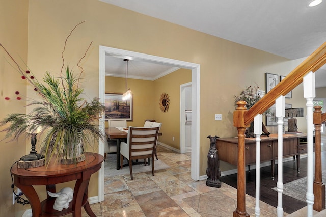 interior space featuring crown molding, stone finish floor, recessed lighting, baseboards, and stairway