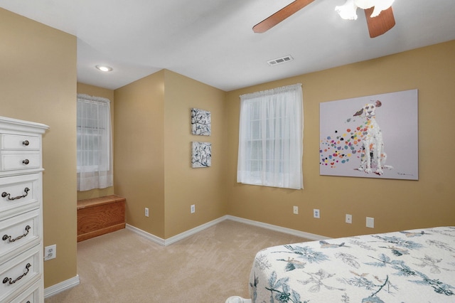 bedroom featuring visible vents, baseboards, ceiling fan, recessed lighting, and light colored carpet