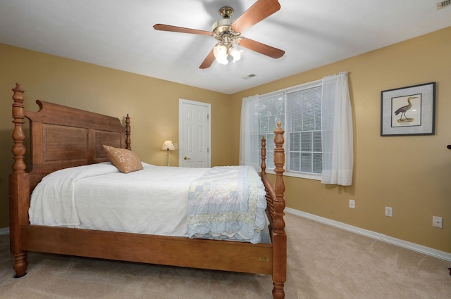 bedroom featuring carpet floors, baseboards, and ceiling fan