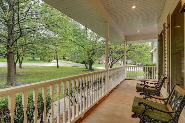 balcony featuring a porch