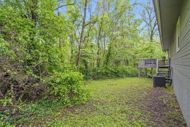 view of yard with a wooden deck