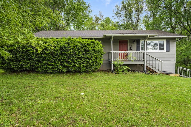 ranch-style home with a front yard