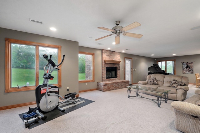living area with a fireplace, carpet floors, a ceiling fan, baseboards, and recessed lighting