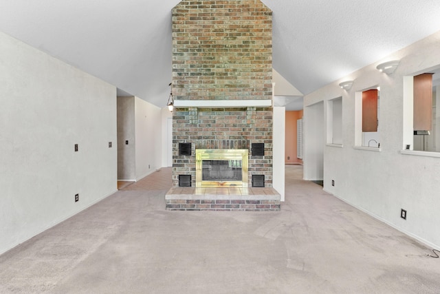 unfurnished living room with baseboards, carpet, vaulted ceiling, and a fireplace