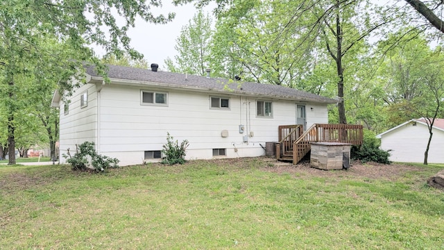 back of house with a yard