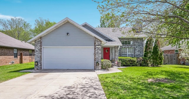 ranch-style house with fence, an attached garage, stone siding, a front yard, and driveway