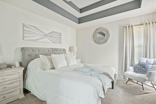 bedroom featuring light carpet