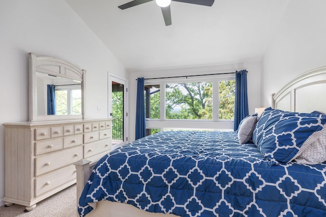 carpeted bedroom with access to outside, a ceiling fan, and vaulted ceiling