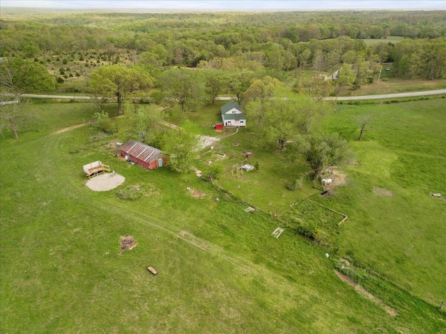 bird's eye view with a forest view and a rural view