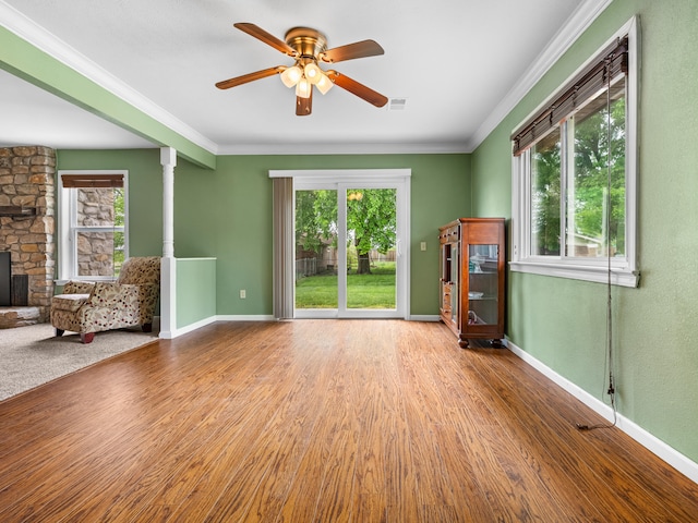 1208 Kemp Dr, Bolivar, MO 65613 - unfurnished living room with wood finished floors and a wealth of natural light
