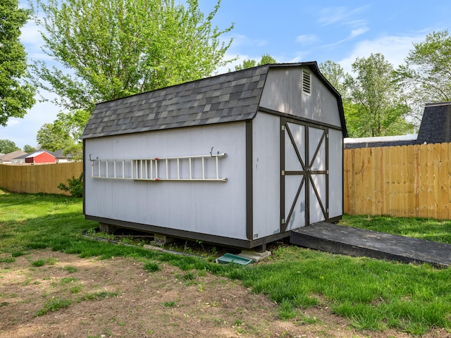 1208 Kemp Dr, Bolivar, MO 65613 - view of shed with a fenced backyard