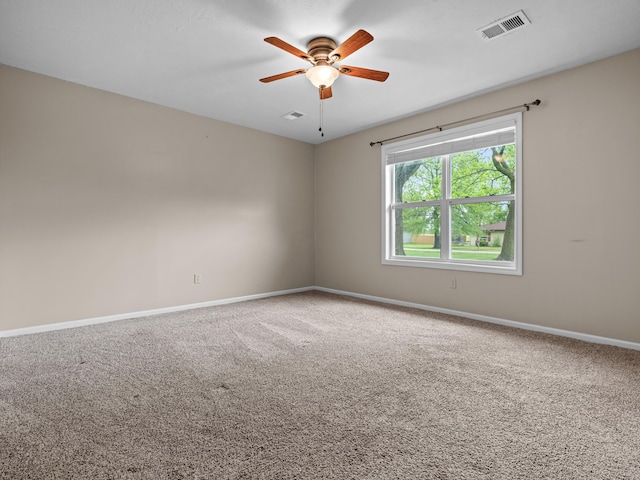 1208 Kemp Dr, Bolivar, MO 65613 - carpeted empty room with baseboards, ceiling fan, and visible vents