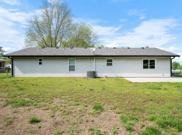 1208 Kemp Dr, Bolivar, MO 65613 - back of house with a yard, central AC, and a patio area