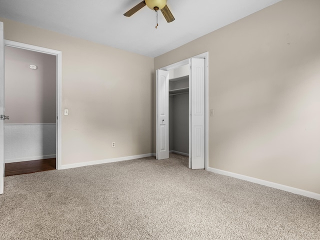 1208 Kemp Dr, Bolivar, MO 65613 - unfurnished bedroom featuring a closet, baseboards, ceiling fan, and carpet flooring