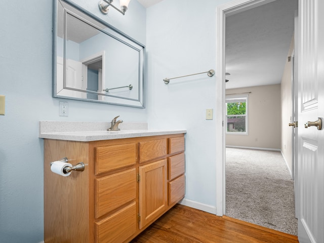 1208 Kemp Dr, Bolivar, MO 65613 - bathroom featuring baseboards and vanity