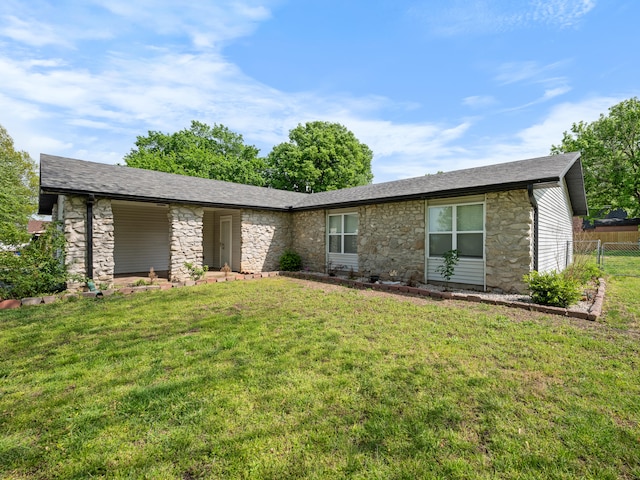 1208 Kemp Dr, Bolivar, MO 65613 - single story home with fence, a shingled roof, stone siding, and a front lawn