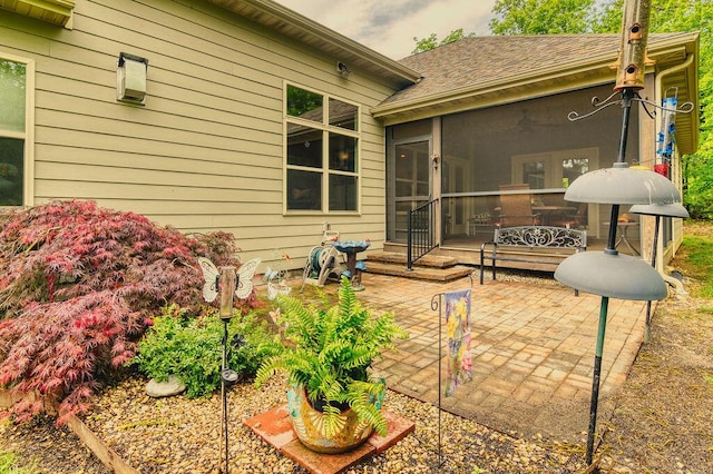 exterior space featuring a sunroom