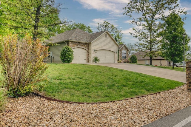 view of front of property with a garage, a front lawn, stone siding, roof with shingles, and concrete driveway