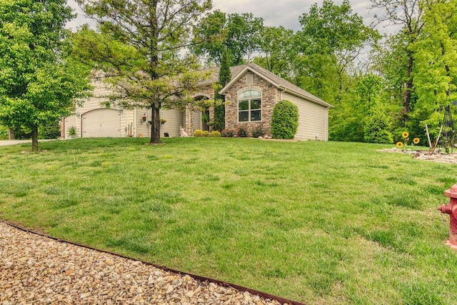 view of yard with an attached garage