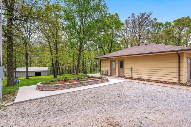 exterior space featuring a front lawn