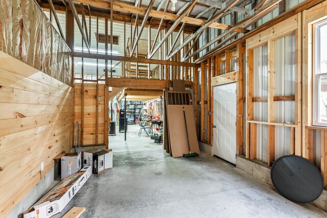misc room featuring concrete floors and a wealth of natural light