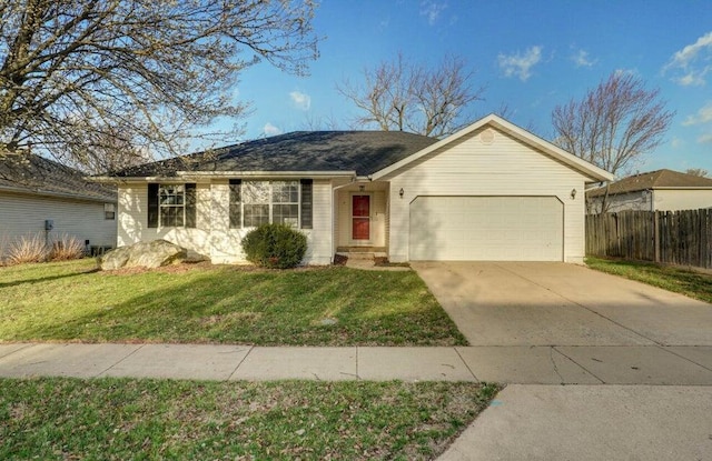 ranch-style home featuring a garage, fence, driveway, and a front lawn
