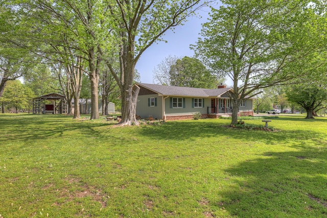 view of yard with a detached carport