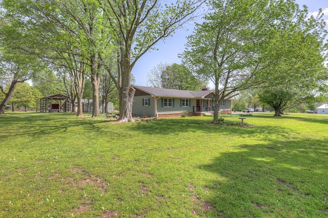 view of yard featuring a gazebo and a detached carport