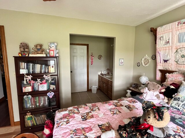 bedroom featuring tile patterned floors