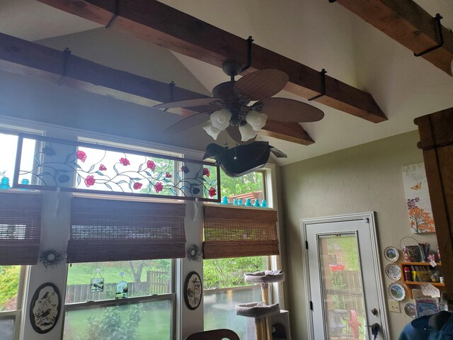 room details with ceiling fan and beam ceiling