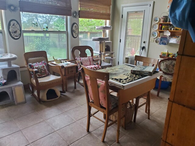 dining space featuring tile patterned floors