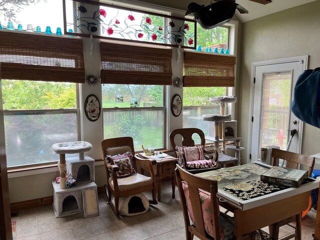 sunroom with tile patterned floors