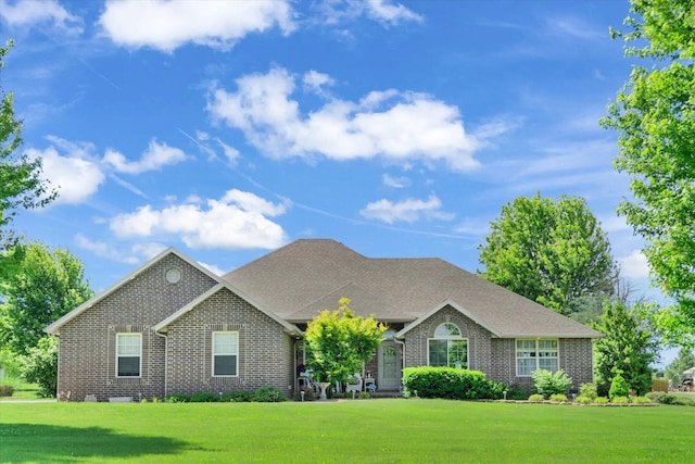 3538 E State Highway Aa, Springfield, MO 65803 - view of front of property featuring brick siding, a front lawn, and a shingled roof